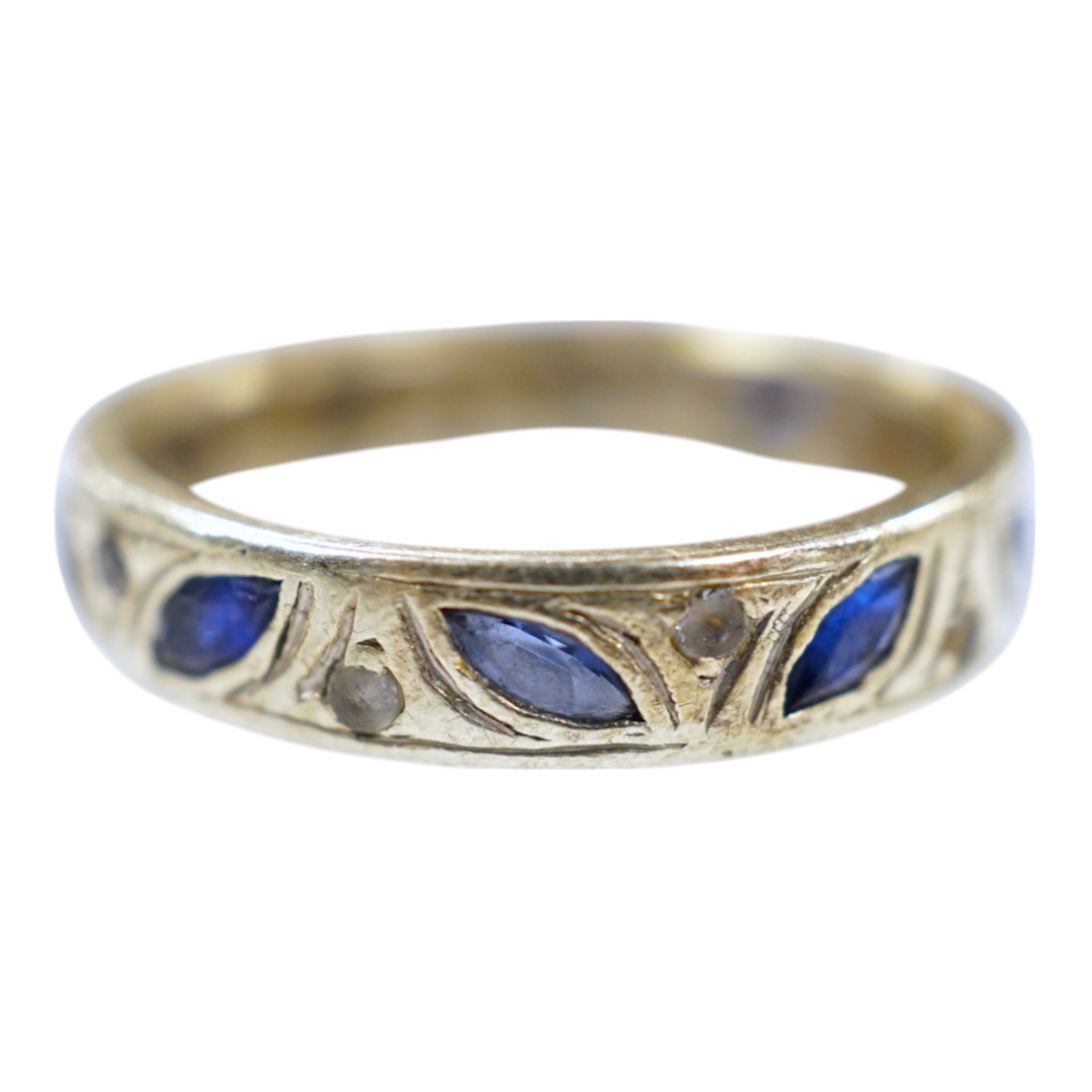 A 9ct white metal, shaped sapphire and diamond chip set eternity ring, size N, gross weight 3.7 grams. Condition - poor